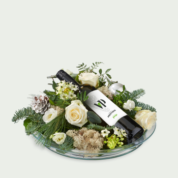 Flower arrangement Christmas with white wine