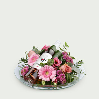 Flower arrangement pink with wine
